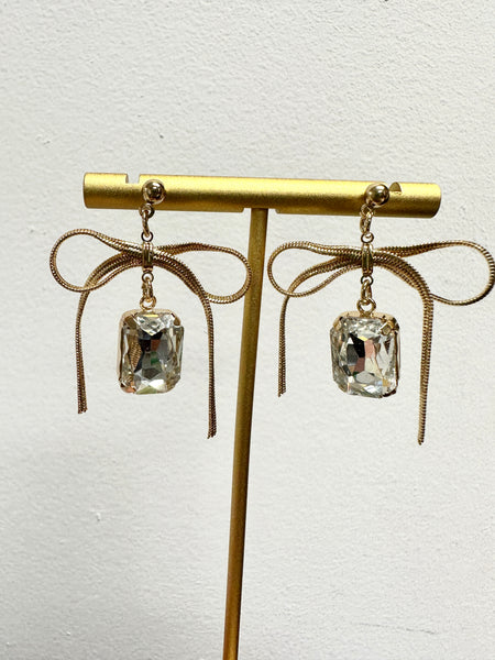 Clear Emerald Cut Stones with Gold Bows