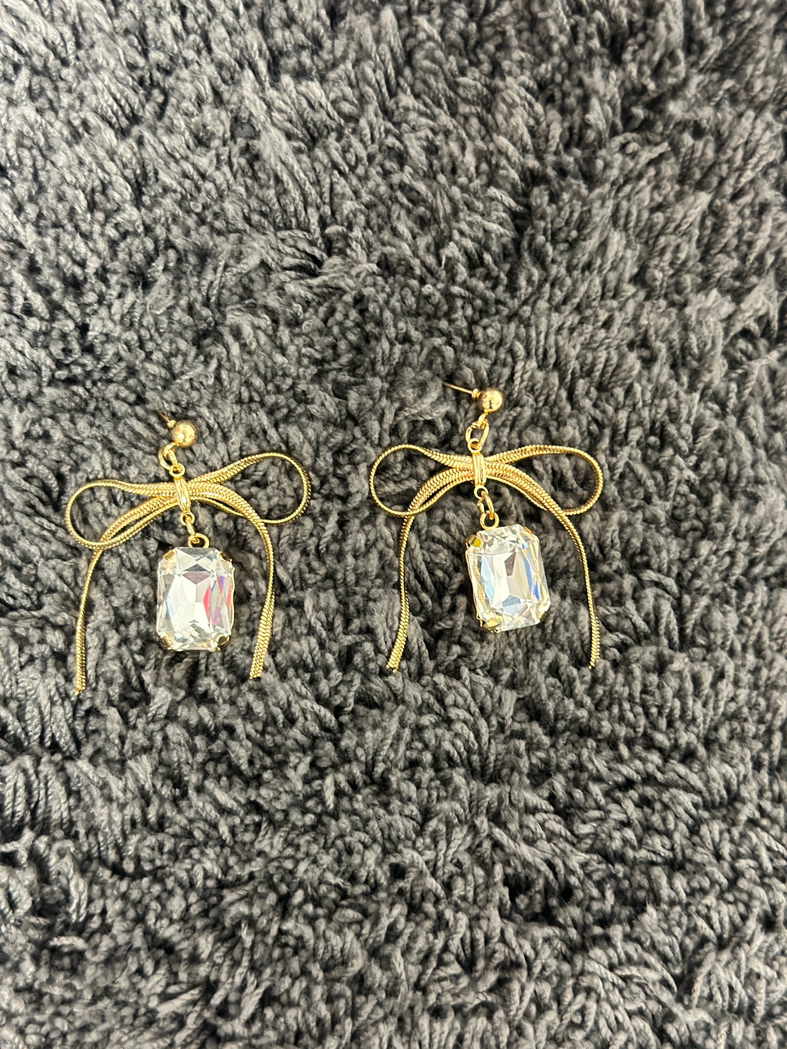 Clear Emerald Cut Stones with Gold Bows